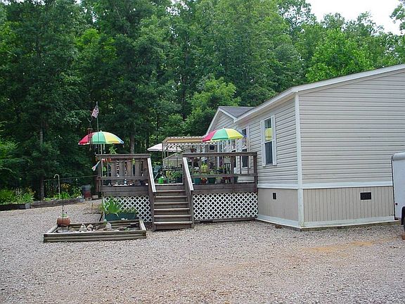 Fun times on deck
						:
						Driveway end of front deck and entry