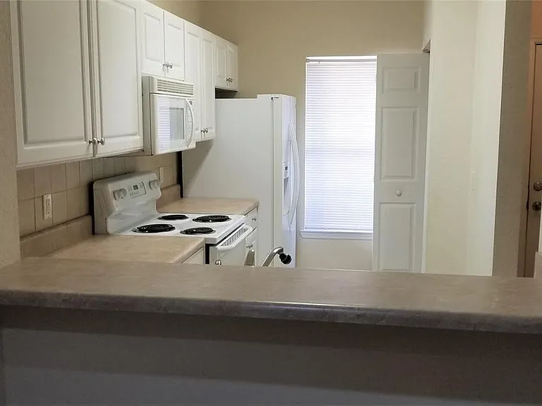 4950 NW 44th Ln #103 — Photo 13