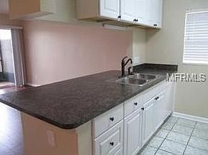 4th image of 9115 Tudor Dr APT 210