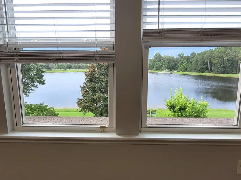 Master bedroom overlooks the lake view directly