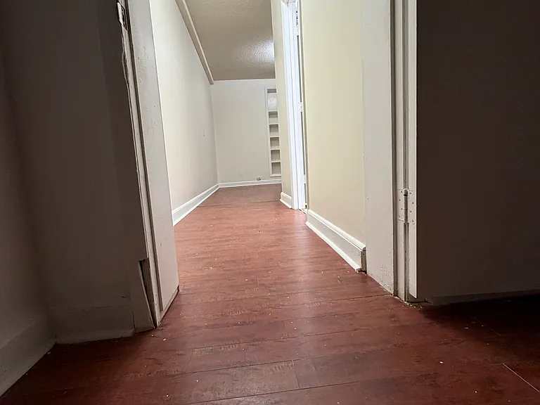Hallway. From Bedroom 3, 2nd bathroom on the right, flex space down the hall.