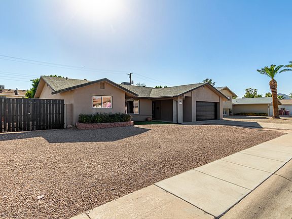 Large parcel with 14' setback on both East & West sides of the property. Lots of room for boat, RV, cars, toys!