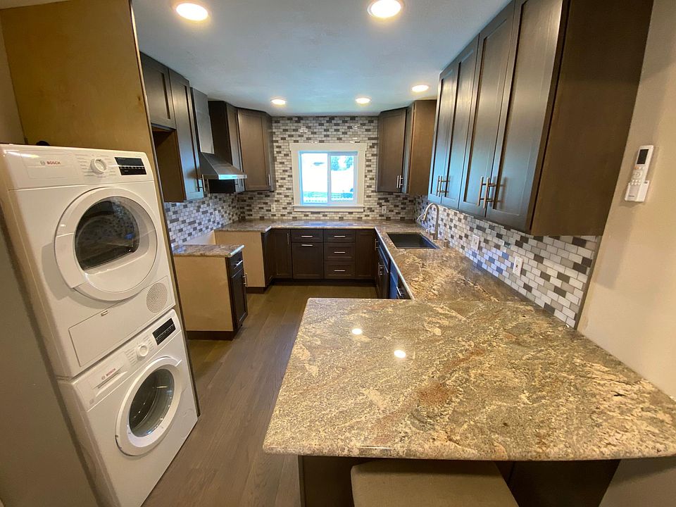 Kitchen with new everything. Dishwasher, stove hod, washer/dryer.