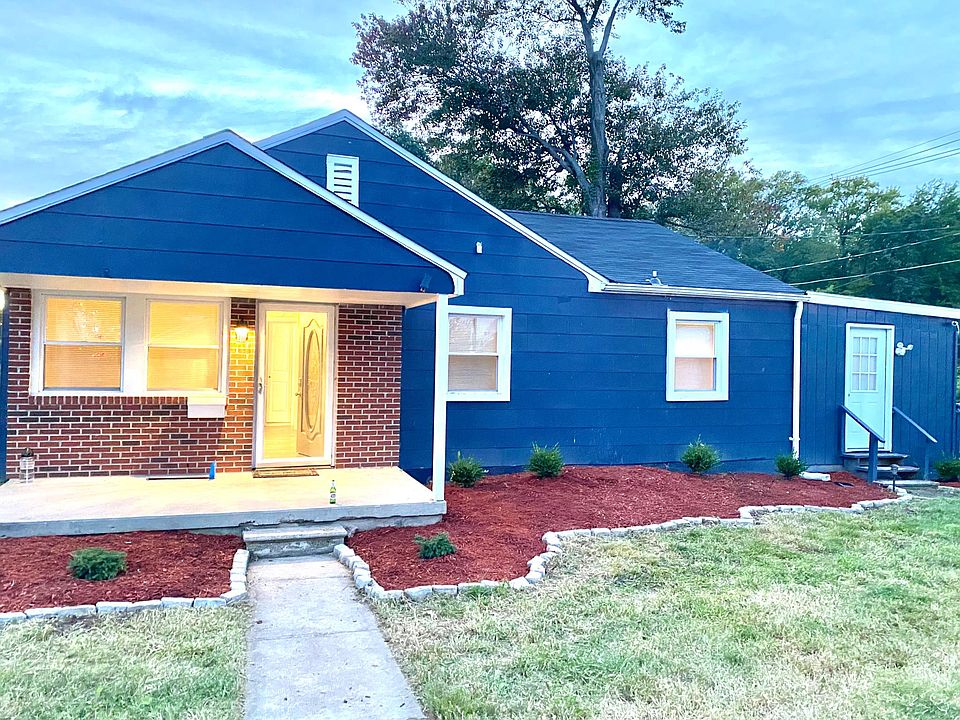 Single family home with porch, deck and fire pit area
