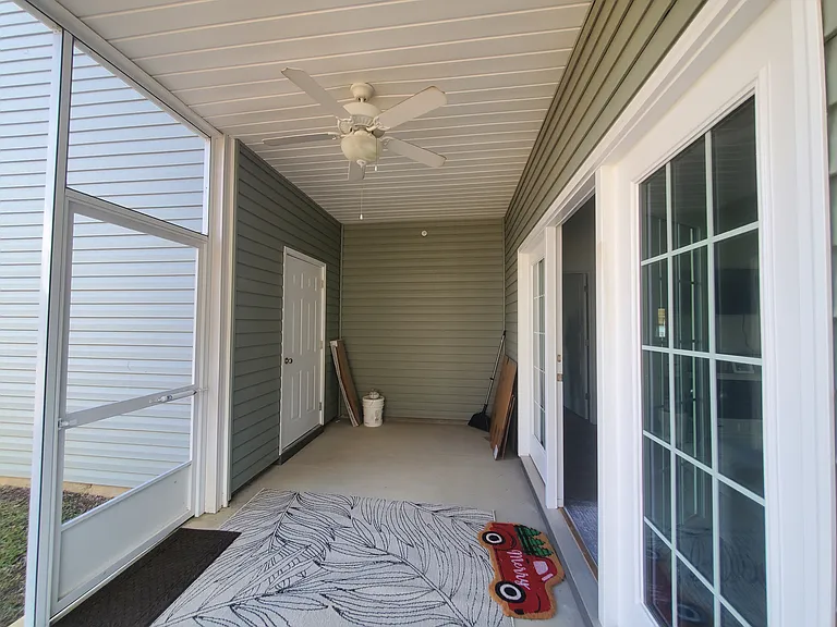 Screened in patio with storage closet