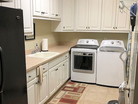 Laundry room w/ fridge&sink
