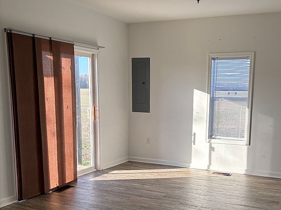 Family room next to kitchen with deck access.