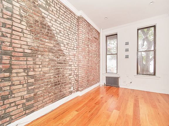 4th image of 104 E 7th St APT 3