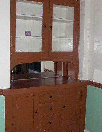 One of many built-in cabinets for storage