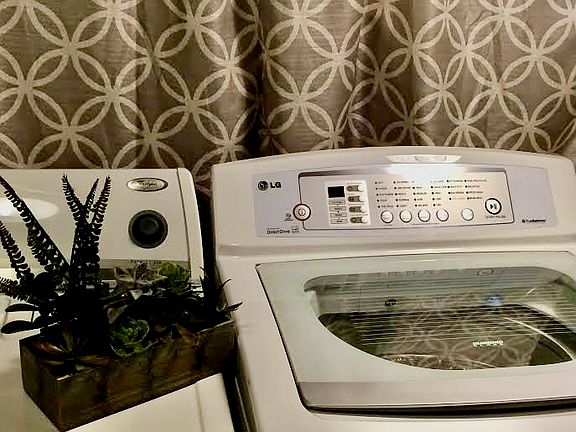 Laundry shared in the basement