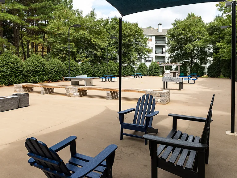 Sport court with shaded seating and games