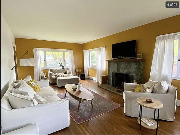 Living room with spacious windows offering plenty of natural light.