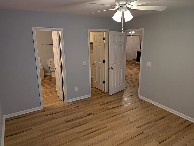 Primary Bedroom with walk in closet and ensuite bathroom