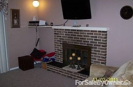 Family Room/Game Room
						:
						Brick woodburning fireplace, access to fenced backyard, open to kitchen