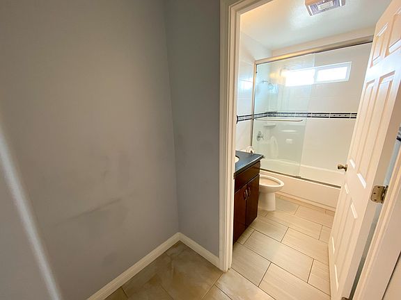 Storage area and bathroom.