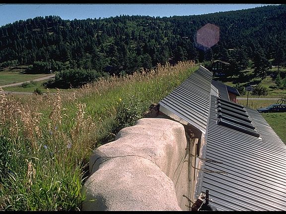 Earth sheltering keeps you warm in the winter and cool in th