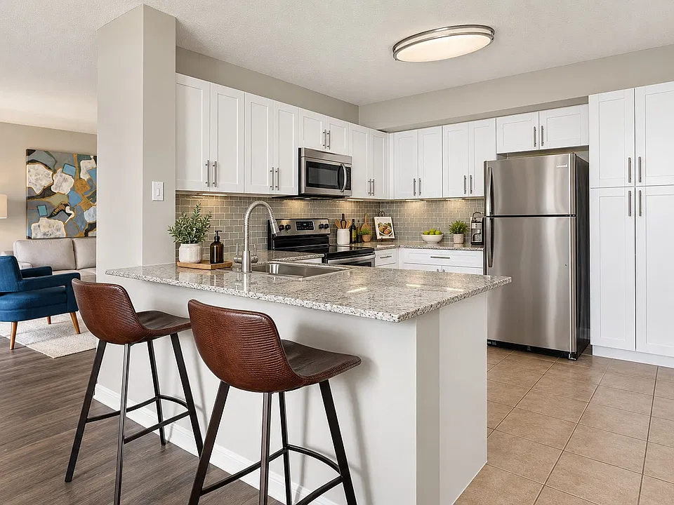 Elevate your living at Weston Place Apartments with modern kitchens featuring sleek finishes, stainless steel appliances, and inviting seating. Enjoy the comfort and style that enhances your lifestyle. Visit us for your new home today!