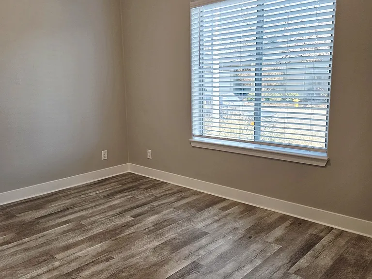 South facing bedroom with large double pane windows for ultra insulation.