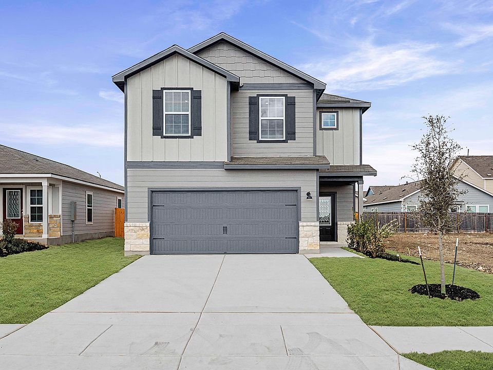 Exterior of the Mesquite plan with professional front yard landscaping