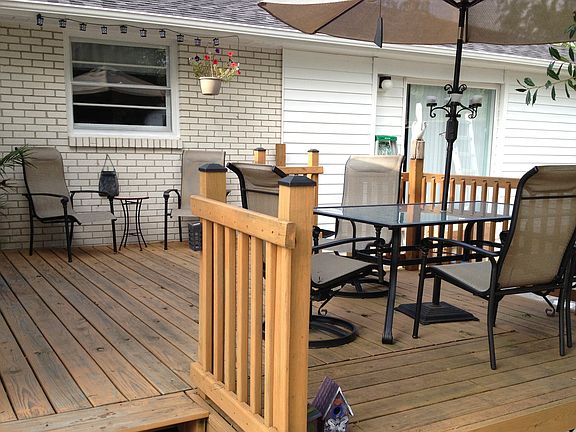 Deck off Sun room by Pool