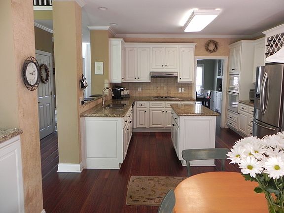 Facing kitchen and dining rm