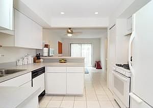 Kitchen with plenty of cabinets and a pantry.
