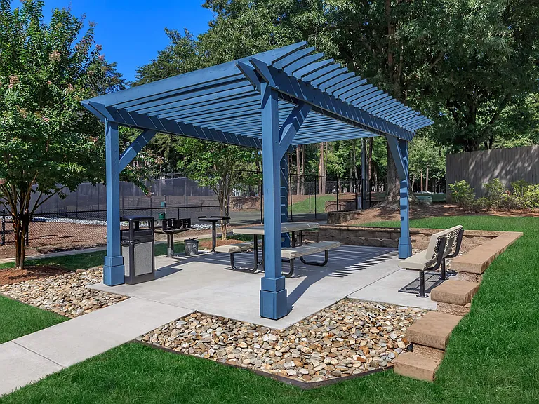 Barbecue Picnic Area with Shaded Pergola and Outdoor Seating