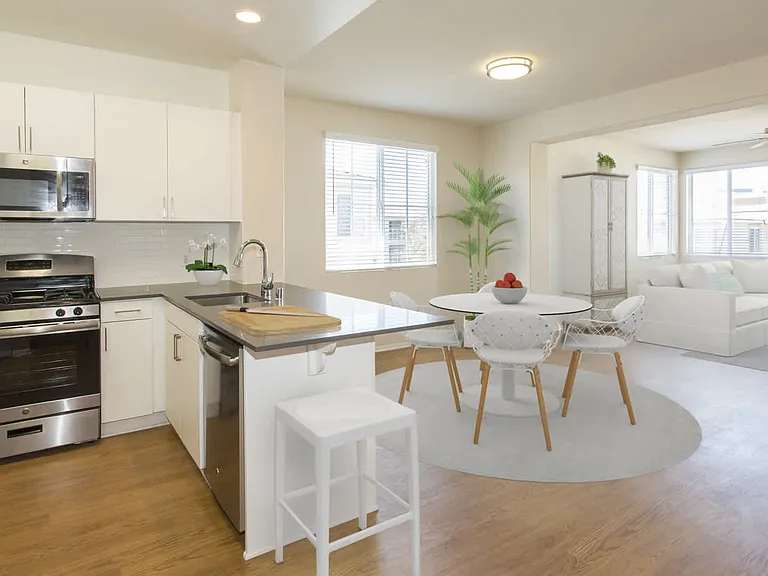 Phase 2 Dining Room and Kitchen with Stainless Steel Appliances and Granite Countertops