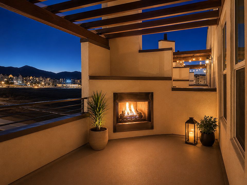 3rd floor terrace with trellis and gas fireplace