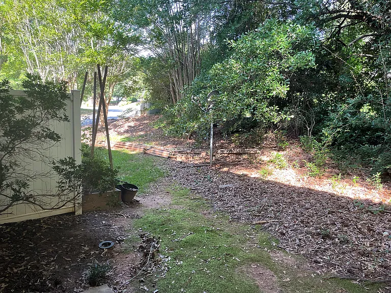The outside patio has lots of trees and great privacy