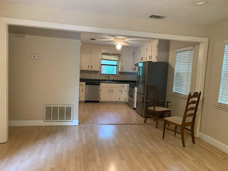 kitchen has stainless steel appliances - fridge/stove and Dishwasher. Washer and Dryer are provided for as long as in working order.
