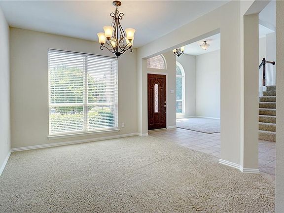 Looking into formal dining and formal living areas.