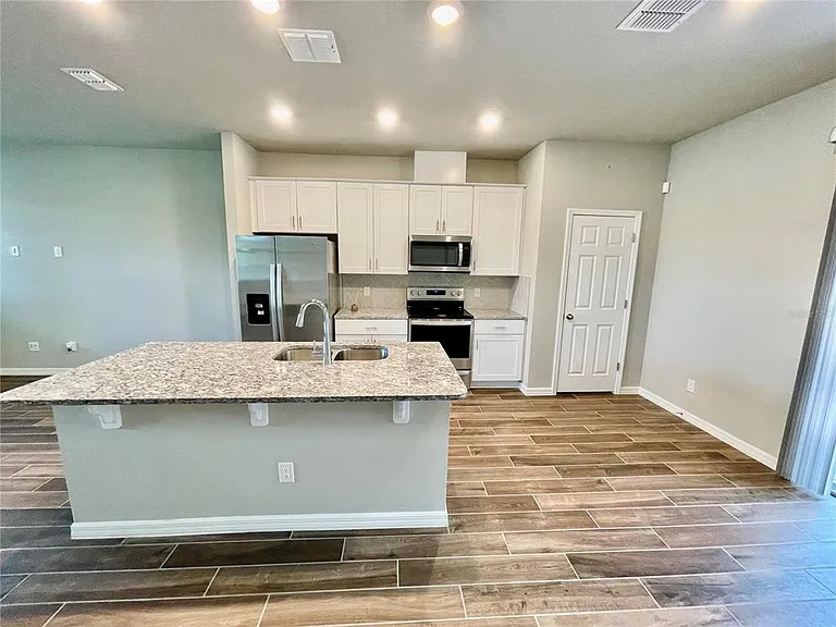 934 Legacy Winds Way — Photo 6