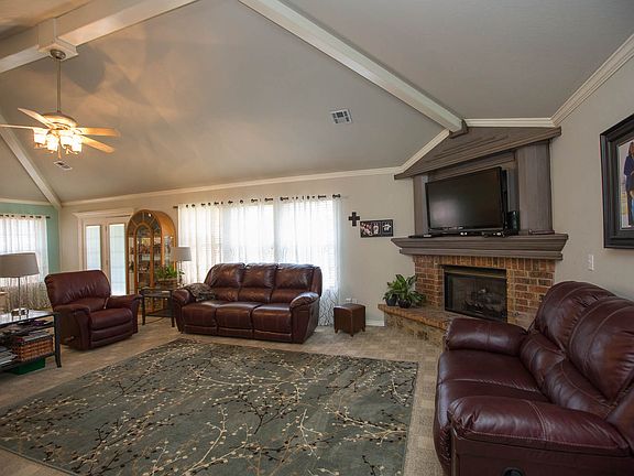 Large open living room with lots of natural light