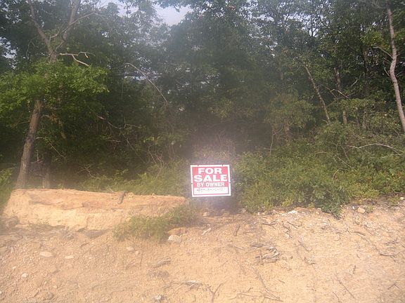 Lot #10 Building Lot
						:
						The street is in and the utility lines are as well.