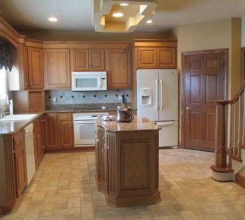 The 24x14 fully equipped Eat in Kitchen is sure to please the family Chef with plenty of cabinets for storage, granite counters,