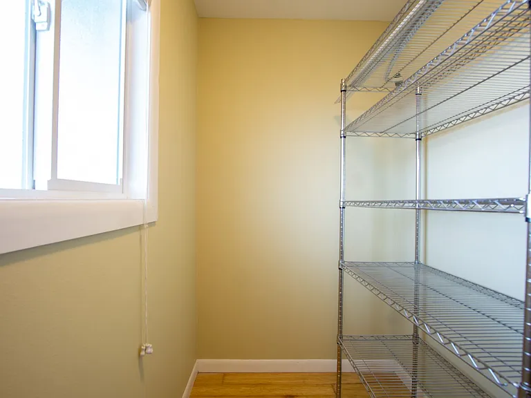 Get 1 Month FREE! Top-Floor 2-Bedroom with Bamboo Flooring + Off-Street Parking! — Photo 10