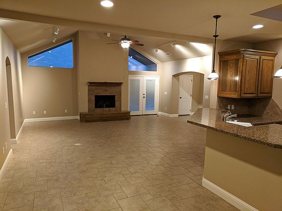 Living area open to kitchen and bar
