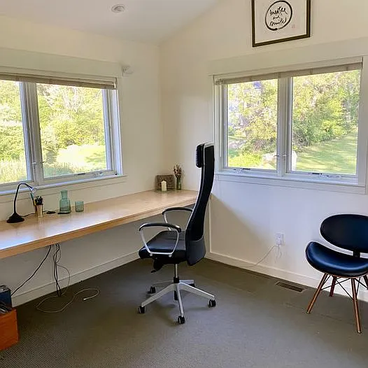 Office and third bedroom with built in desk and Murphy bed
