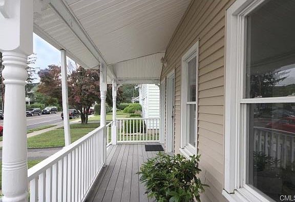 Covered front porch perfect for sipping iced tea