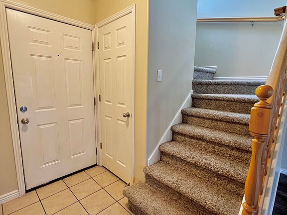 Front door entry area with coat closet