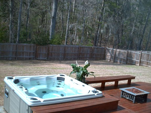 Large, fenced in backyard