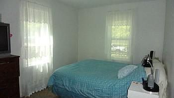 Main floor bedroom. The main bath is adjacent to this room.