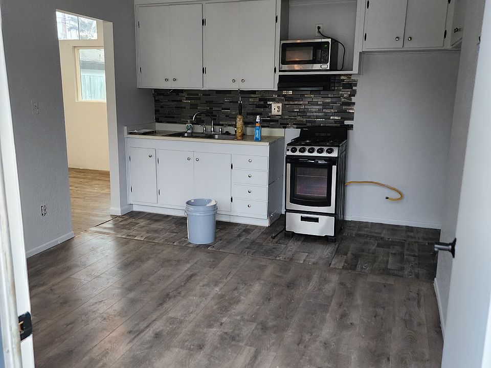Enter into living room and kitchen.