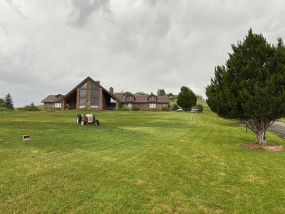 Home on hill, facing west.