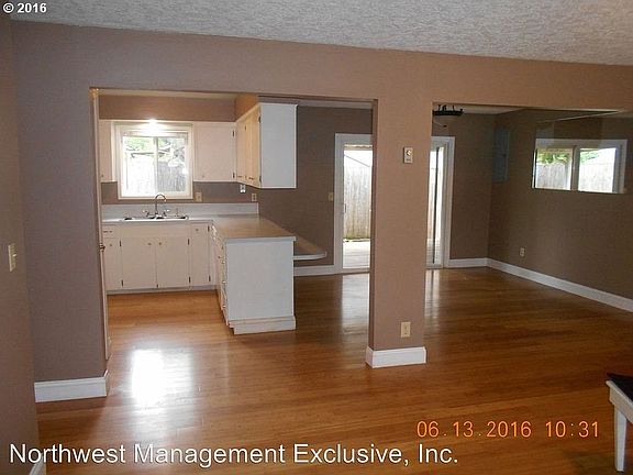 4th image of 9903 Saint Helens Ave
