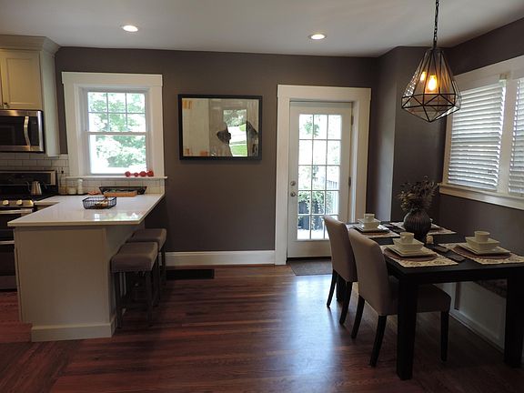 Kitchen + Dining + Door to deck