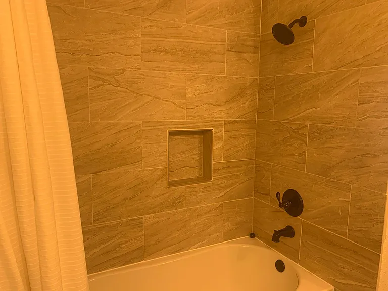 Shower over tub with tile