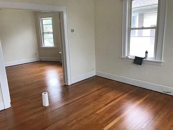 living room is immediate room with bedroom in far picture