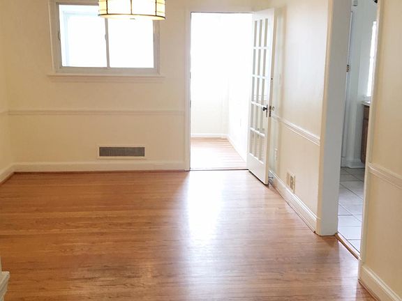 dining room leading to back enclosed porch